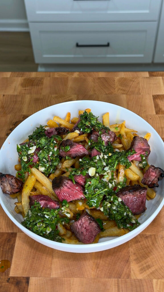 loaded steak fries with chimichurri